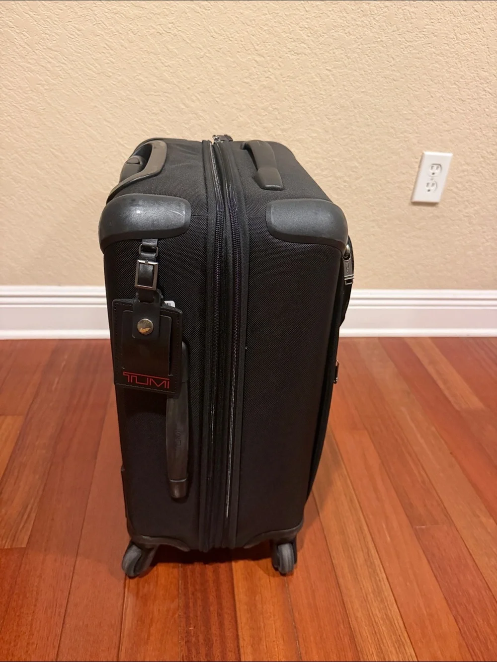 Tumi Black Upright Carry-On with Front Pocket